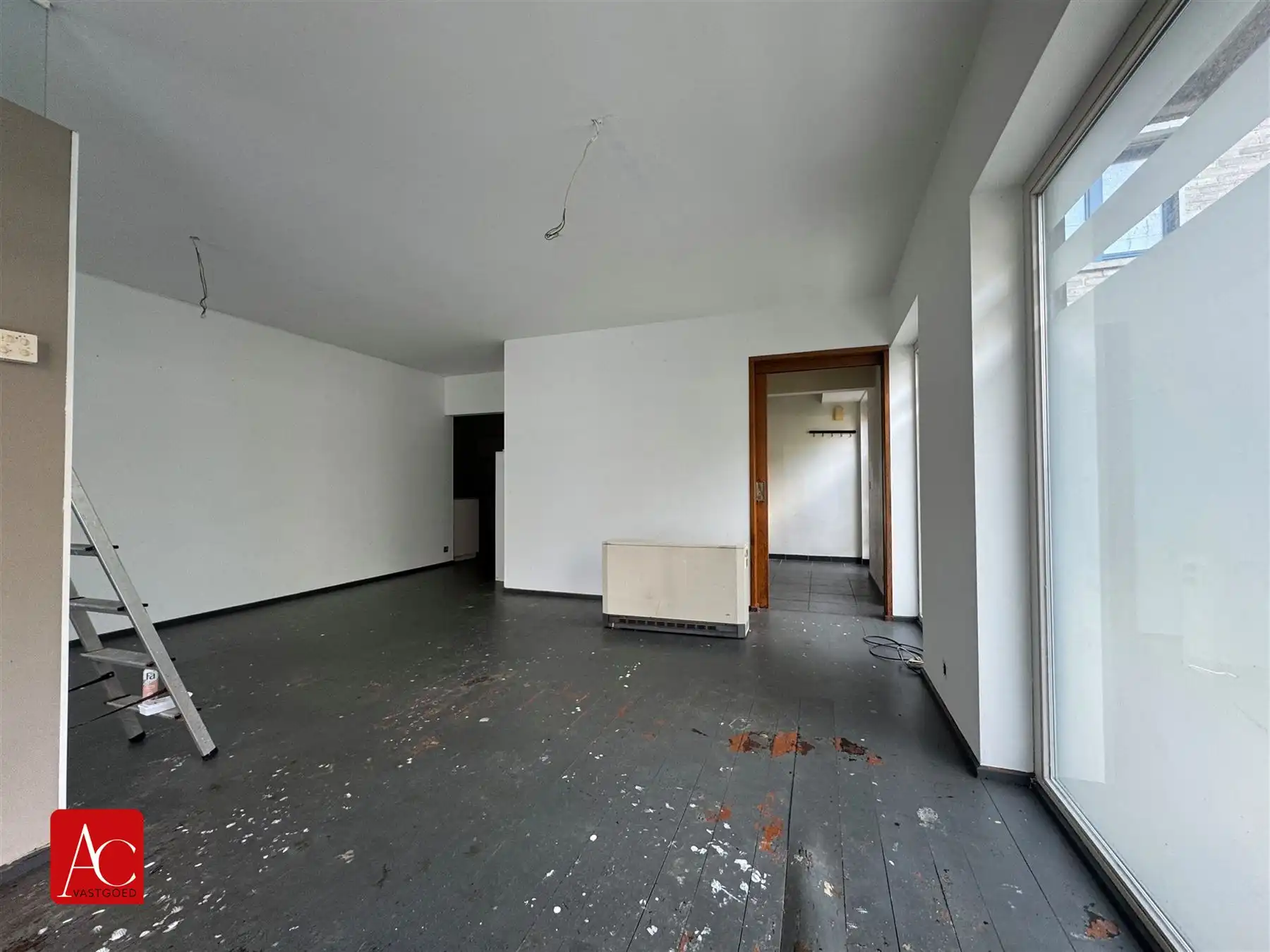Gelijkvloers appartement, mogelijkheid tot handelszaak foto 4