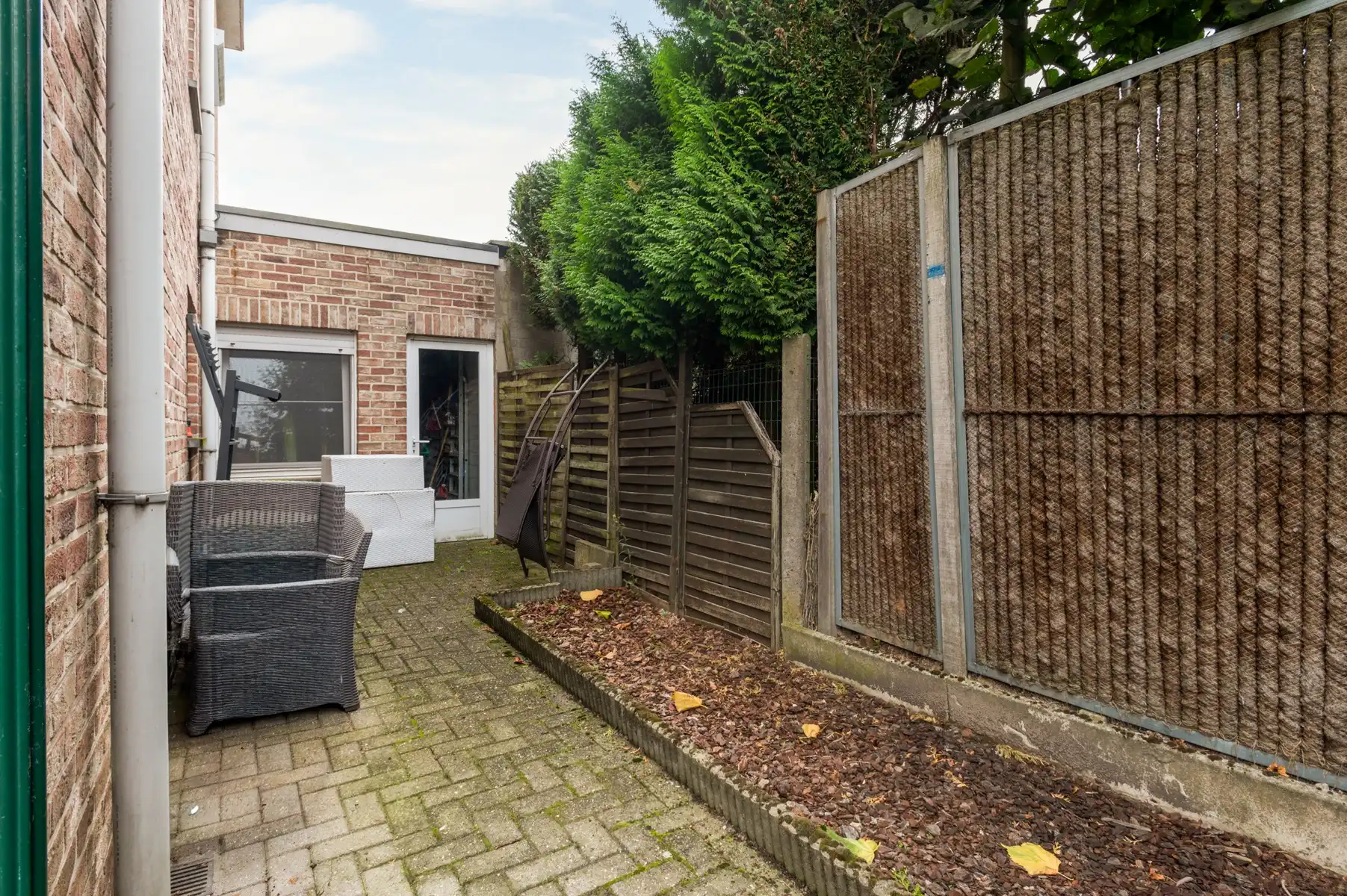 Gelijkvloersappartement met zonnige tuin, garage en staanplaats foto 14