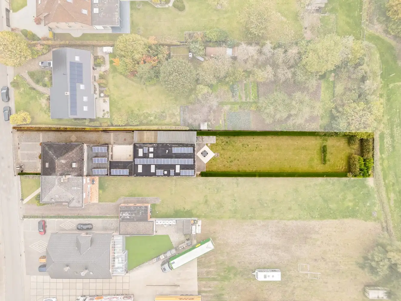Veelzijdig (handels)huis met atelier, magazijn en zalige tuin op 1.400 m² te Meldert foto 5