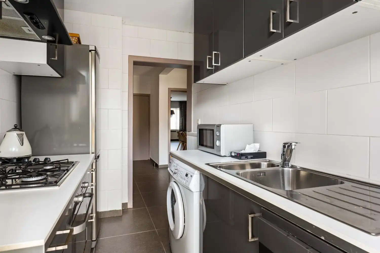 Instapklaar gelijkvloers appartement met zonnige tuin foto 6