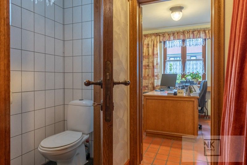 Charmante fermette woning met 4 slaapkamers, bureau en ruime werkplaats op een prachtig perceel in Arendonk! foto 7