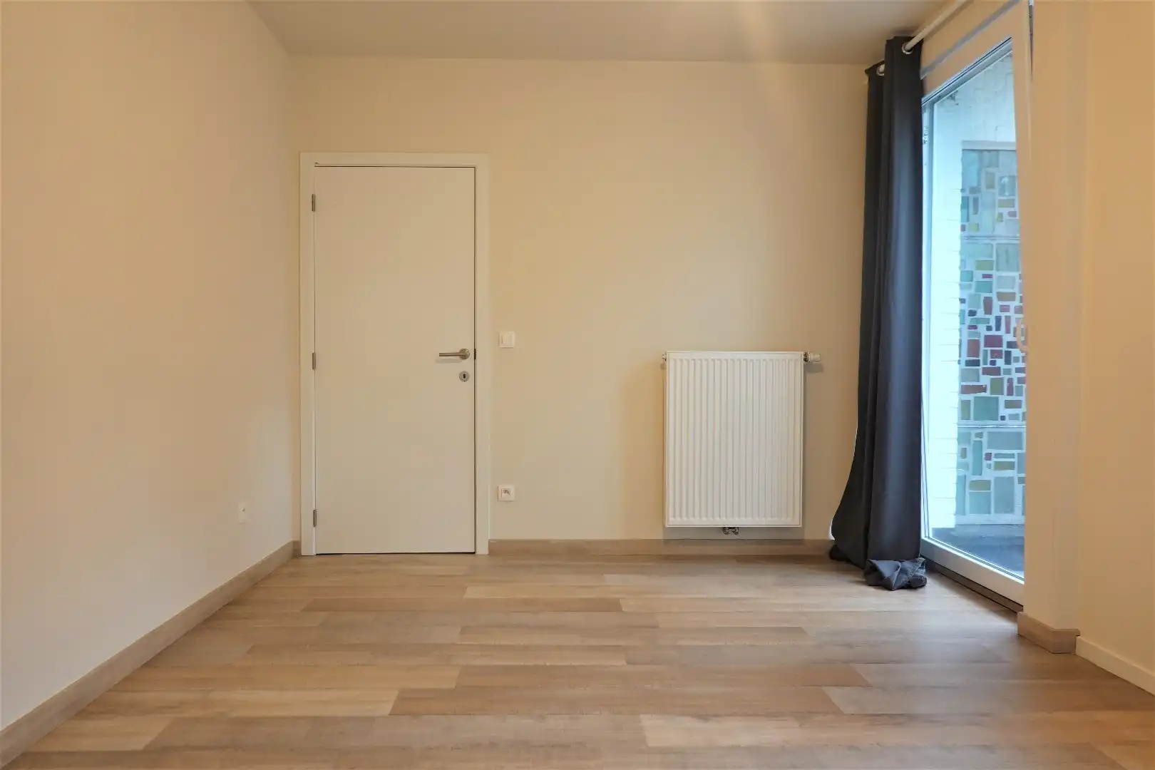 Ruim gelijkvloers appartement met koertje  foto 12
