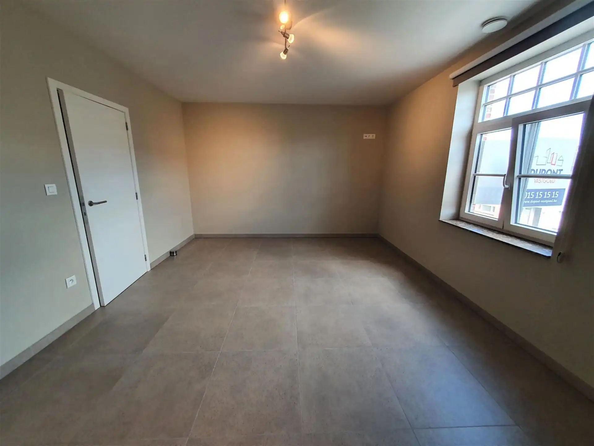 Ruim Appartement 2 Slpk met Groot Terras 20m² + Garagebox foto 2