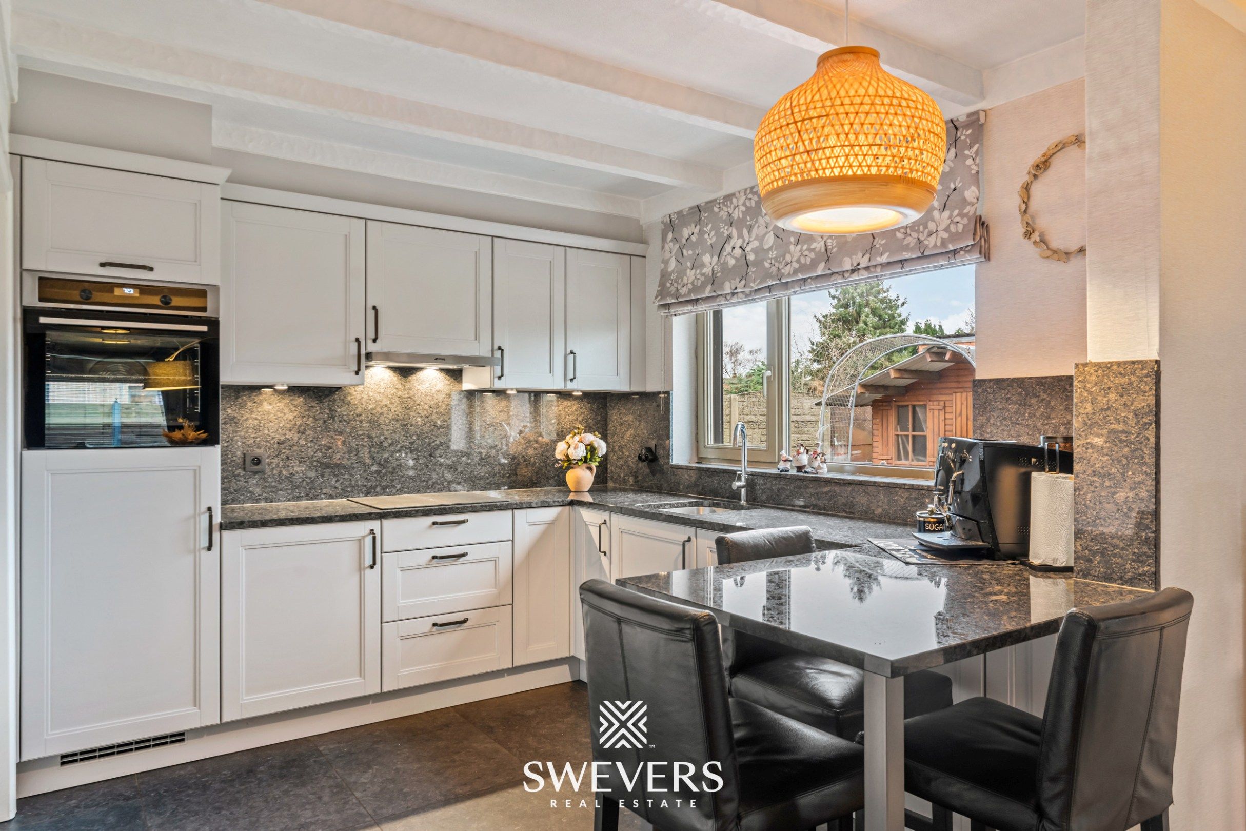 Instapklare open bebouwing met zuidgerichte tuin nabij het centrum van Heusden foto 10