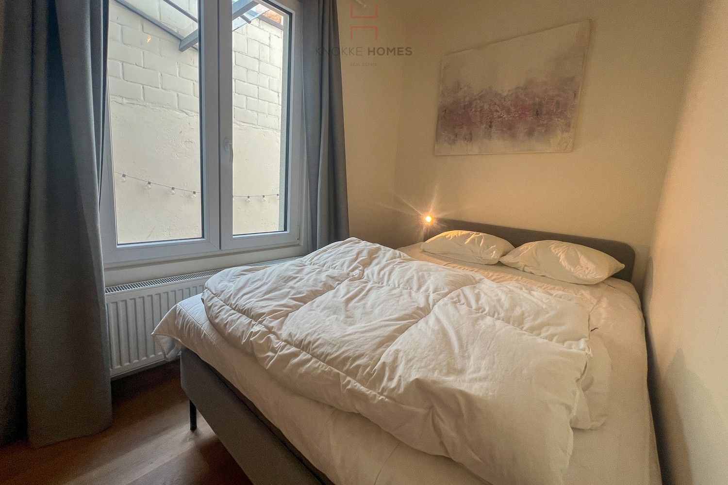 Instapklaar gelijkvloersappartement met twee slaapkamers in het centrum van Knokke, gelegen aan het levendige Gemeenteplein foto 14