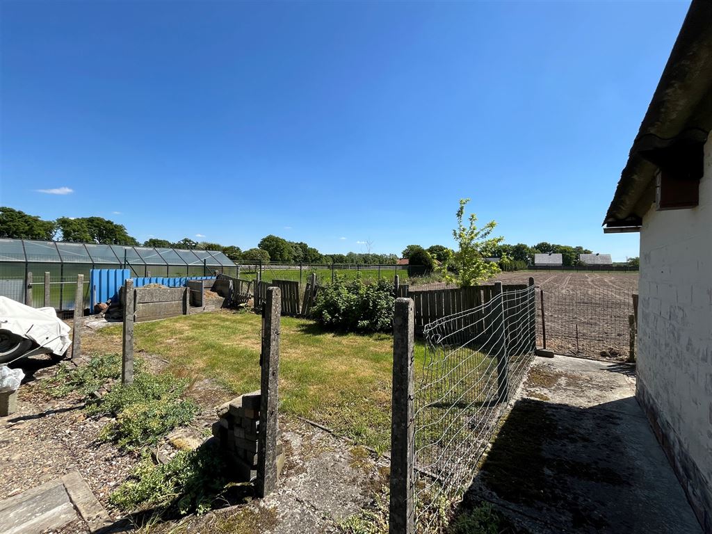Vrijstaande, gelijkvloerse gezinswoning foto 11