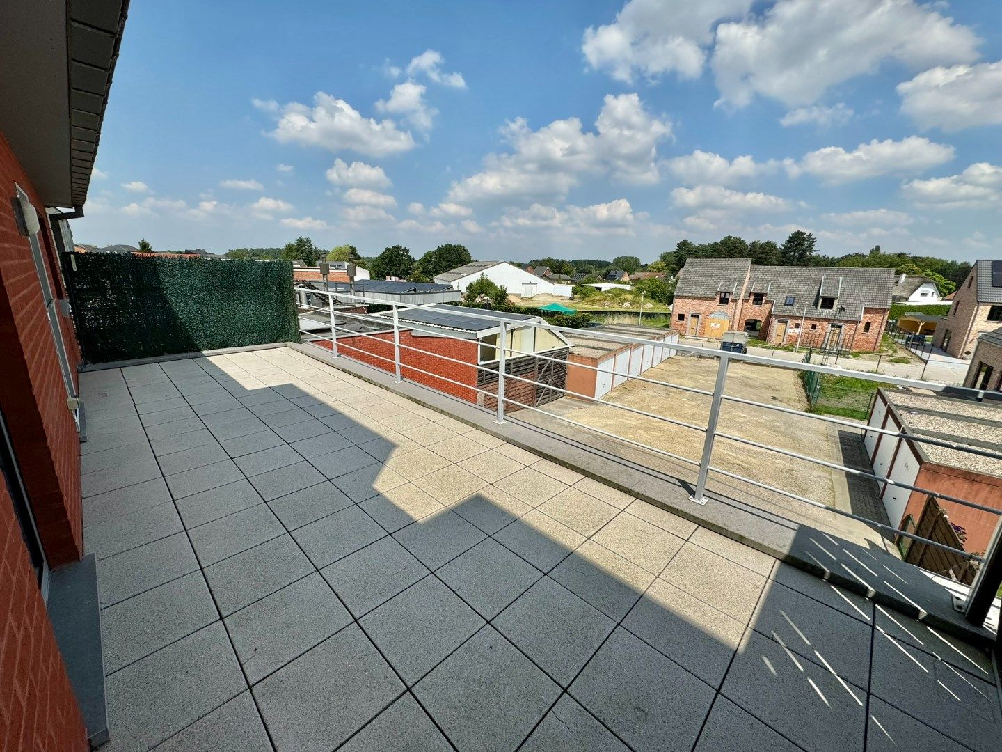 Ruim appartement met 3 slaapkamers en groot terras in centrum Uitbergen  foto 12