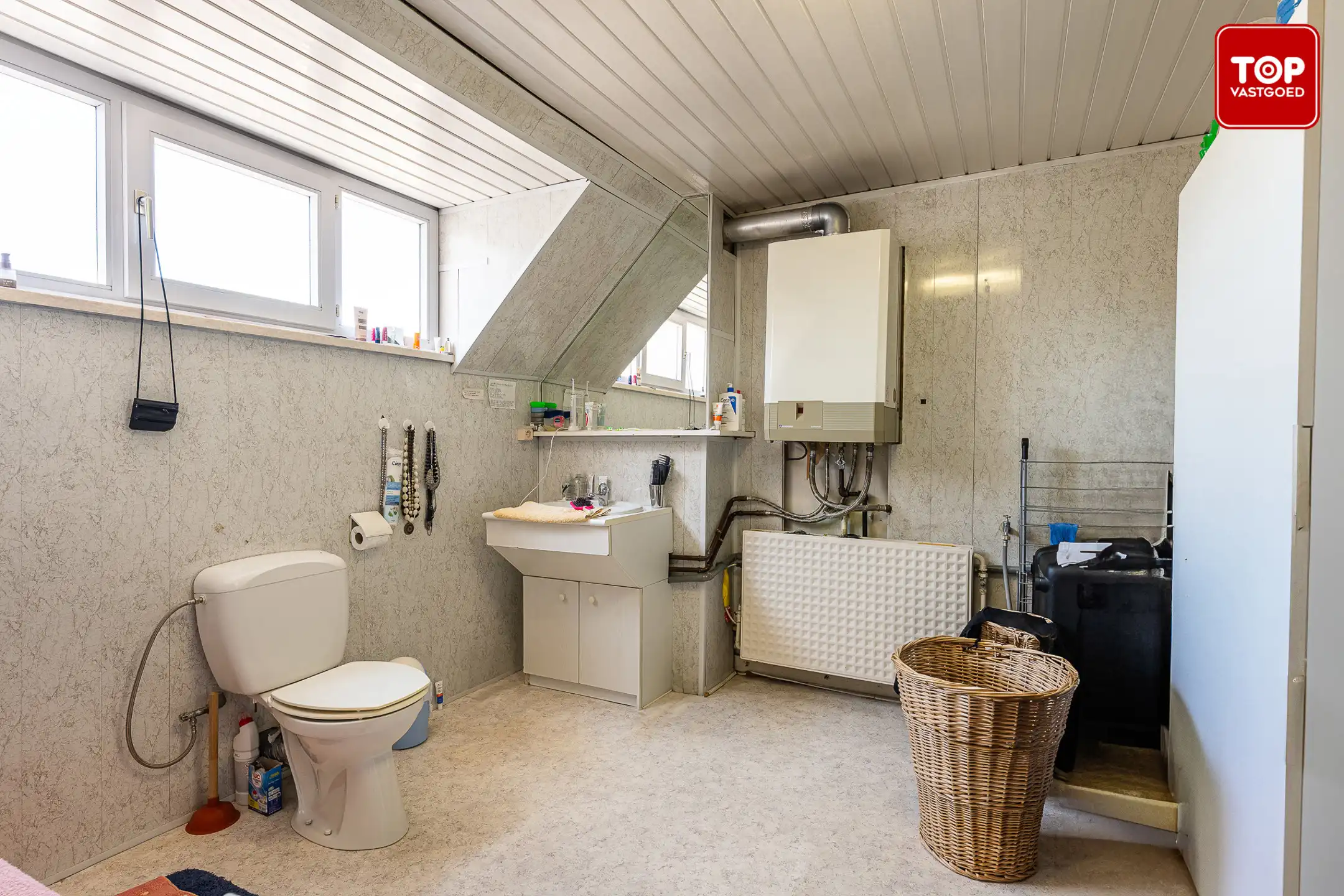 Woning met handelsgelijkvloers op een commercieel interessante ligging.  foto 21
