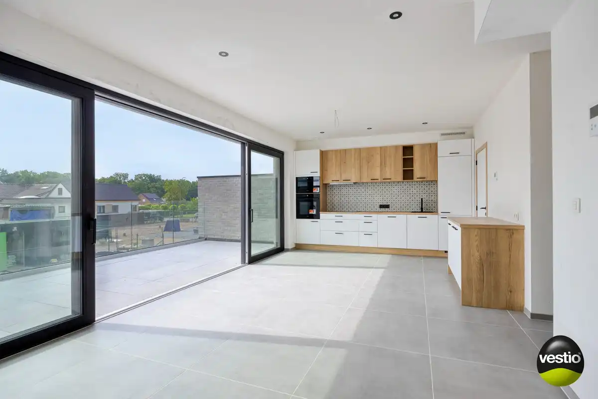 Nieuwbouwappartement met 2 slaapkamers en ruim terras in Munsterbilzen – slechts 2% registratierechten! foto 5
