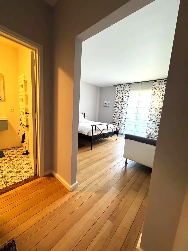 Woning met aparte praktijkruimte(opslagruimte) op strategisch gelegen locatie, instapklaar en energiezuinig! foto 12