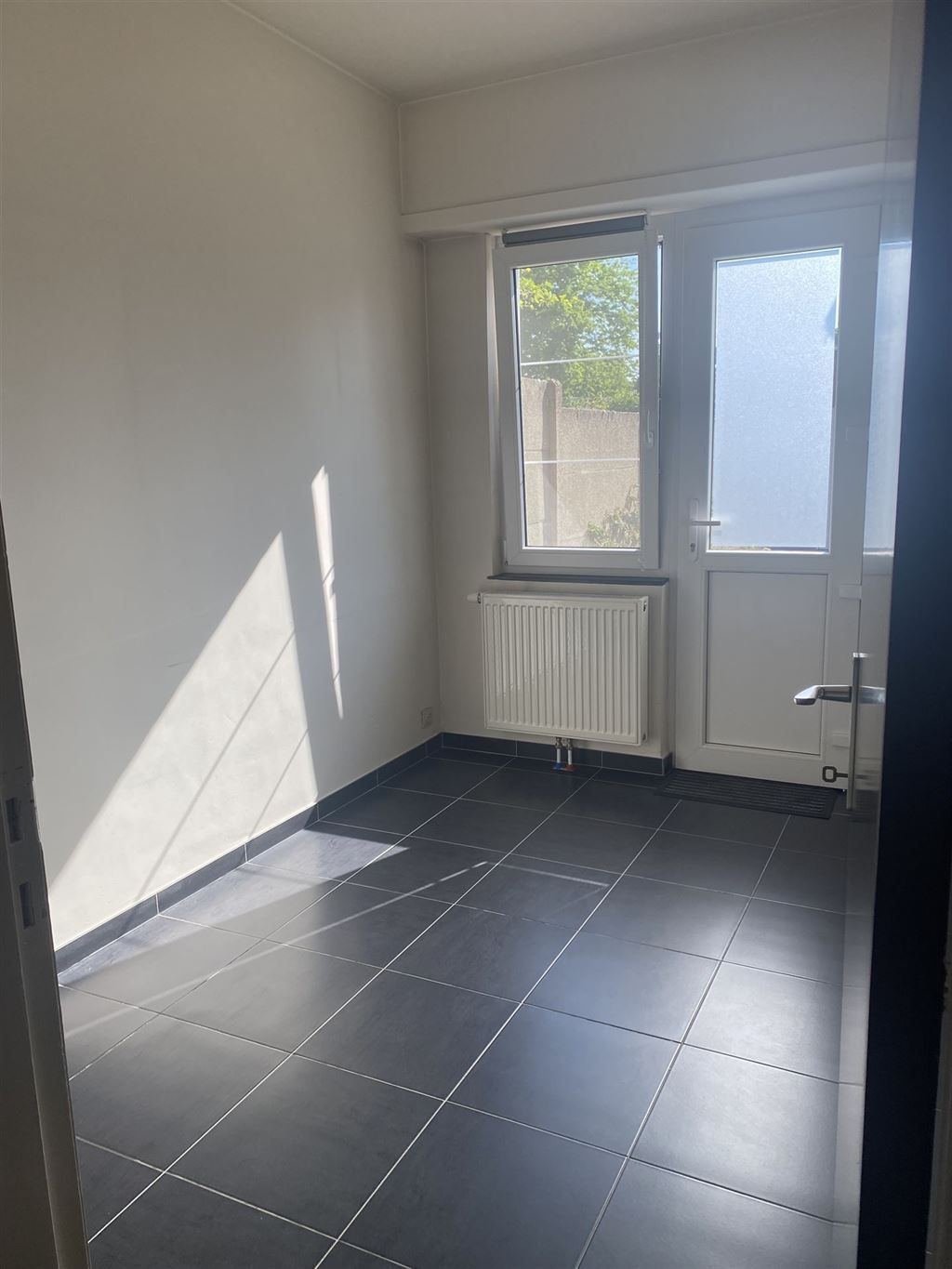 Gelijkvloers appartement in rustige straat foto 9