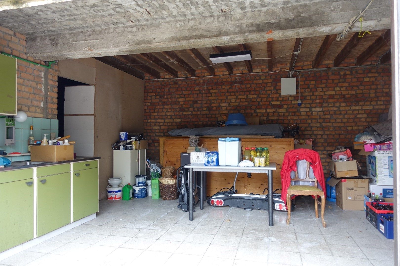 Op te frissen handelspand met woonst en garages op een uitstekende locatie in centrum Oudenburg foto 24