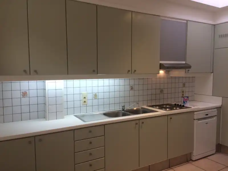 OPBRENGSTEIGENDOM, Handelspand met duplex appartement foto 13