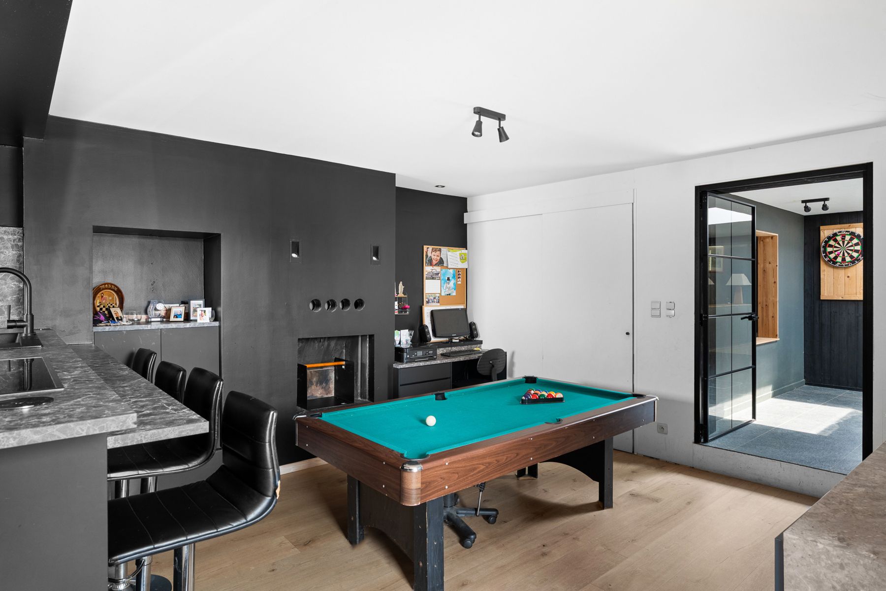 Instapklare halfopen woning met ZO-tuin én garage in Melsen! foto 5