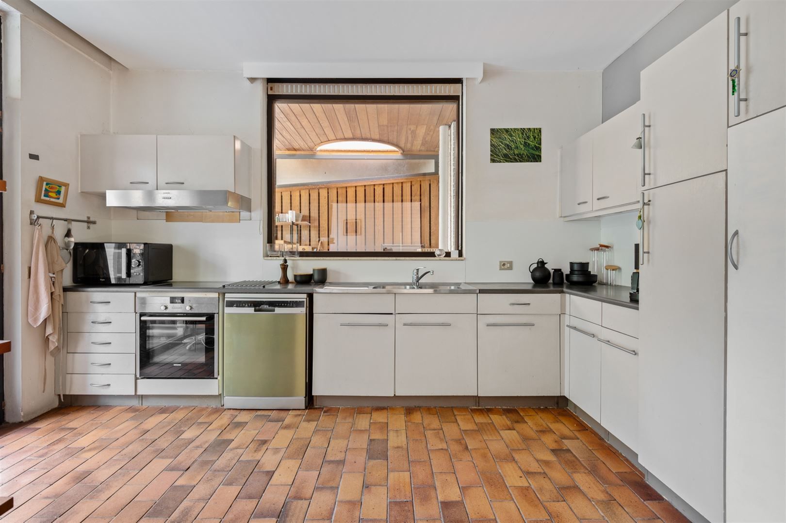 Te renoveren woning met grote tuin en garages in landelijke omgeving foto 8