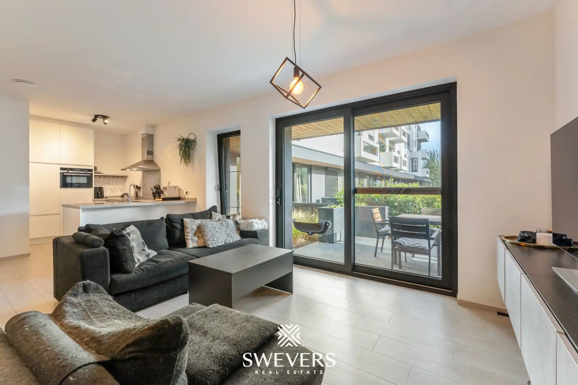 Instapklaar, energiezuinig gelijkvloers appartement (99 m²) met garage en kelders in het pittoreske Bolderberg foto 4