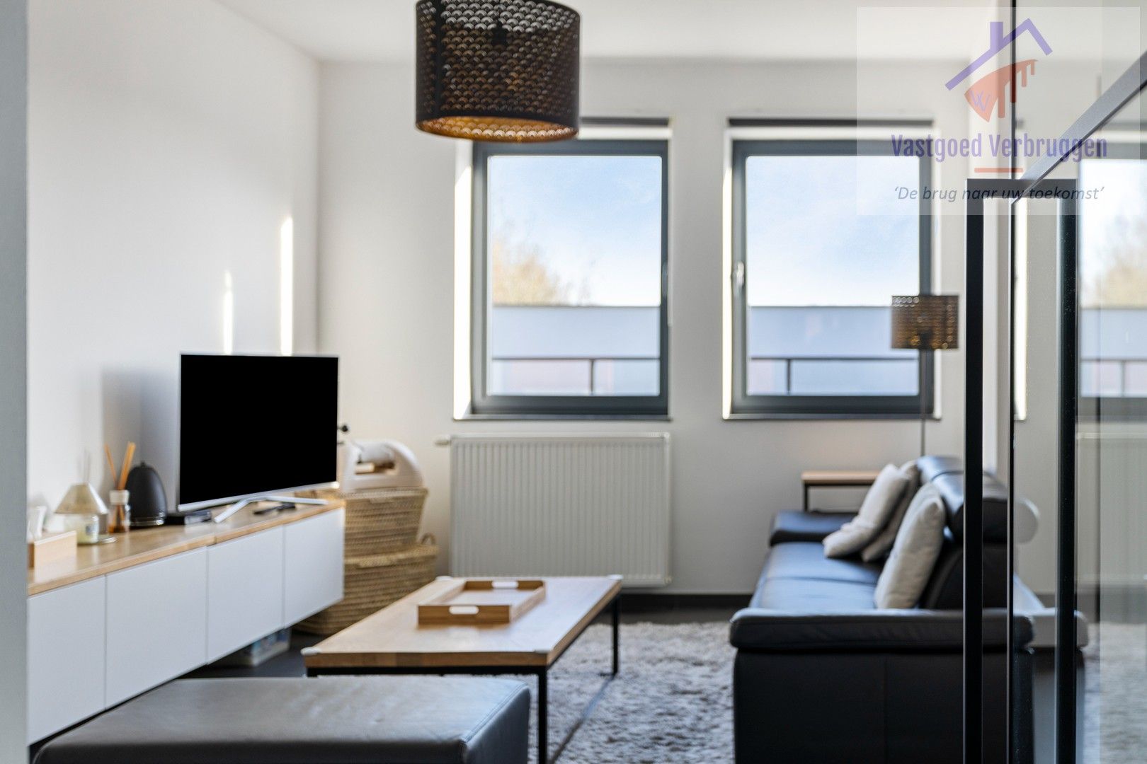 Modern, energiezuinig gelijkvloers appartement met garagebox in Iddergem foto 2