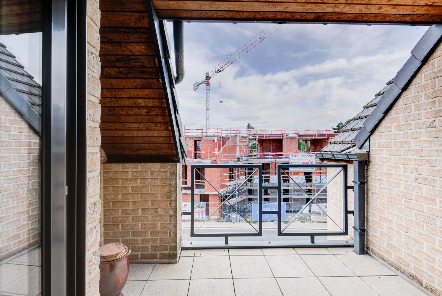 DUPLEXAPPARTEMENT MET 2 SLAAPKAMERS, 2 TERRASSEN EN GARAGEBOX AAN HET CENTRUM VAN BILZEN foto 12