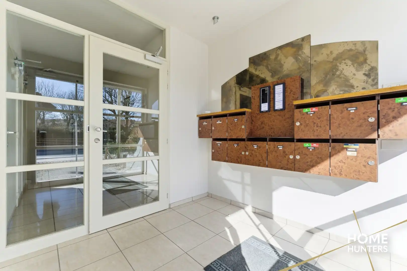 Instapklaar gelijkvloers appartement met 2 slaapkamers en ruime tuin foto 3