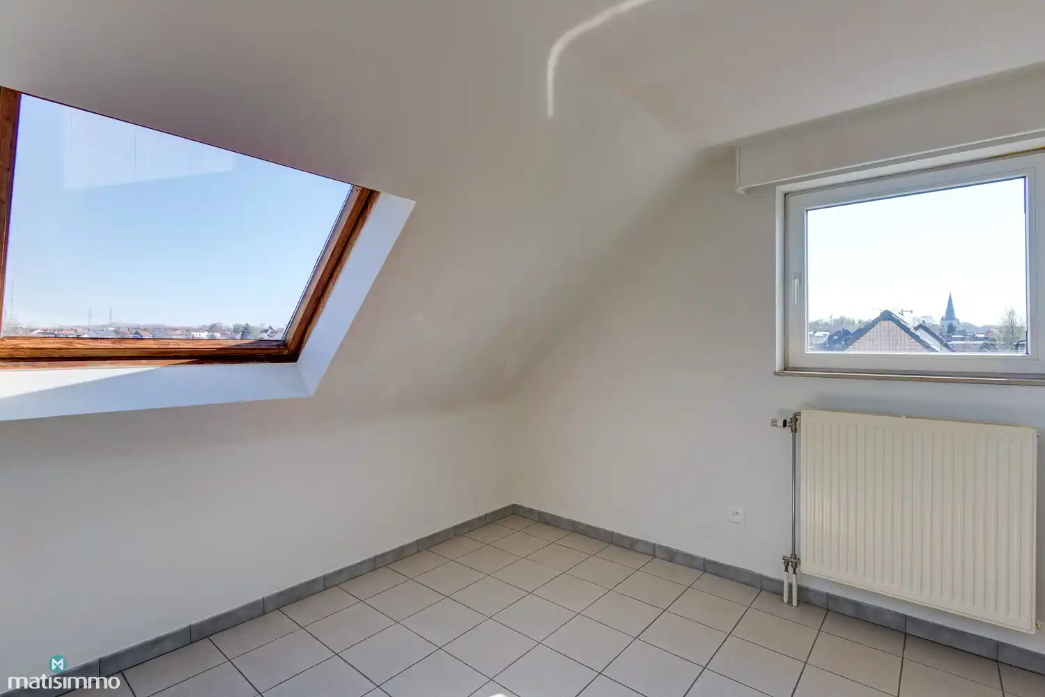 INSTAPKLAAR DUPLEX-APPARTEMENT MET 2 SLAAPKAMERS EN GARAGE NABIJ HET CENTRUM VAN BILZEN foto 11