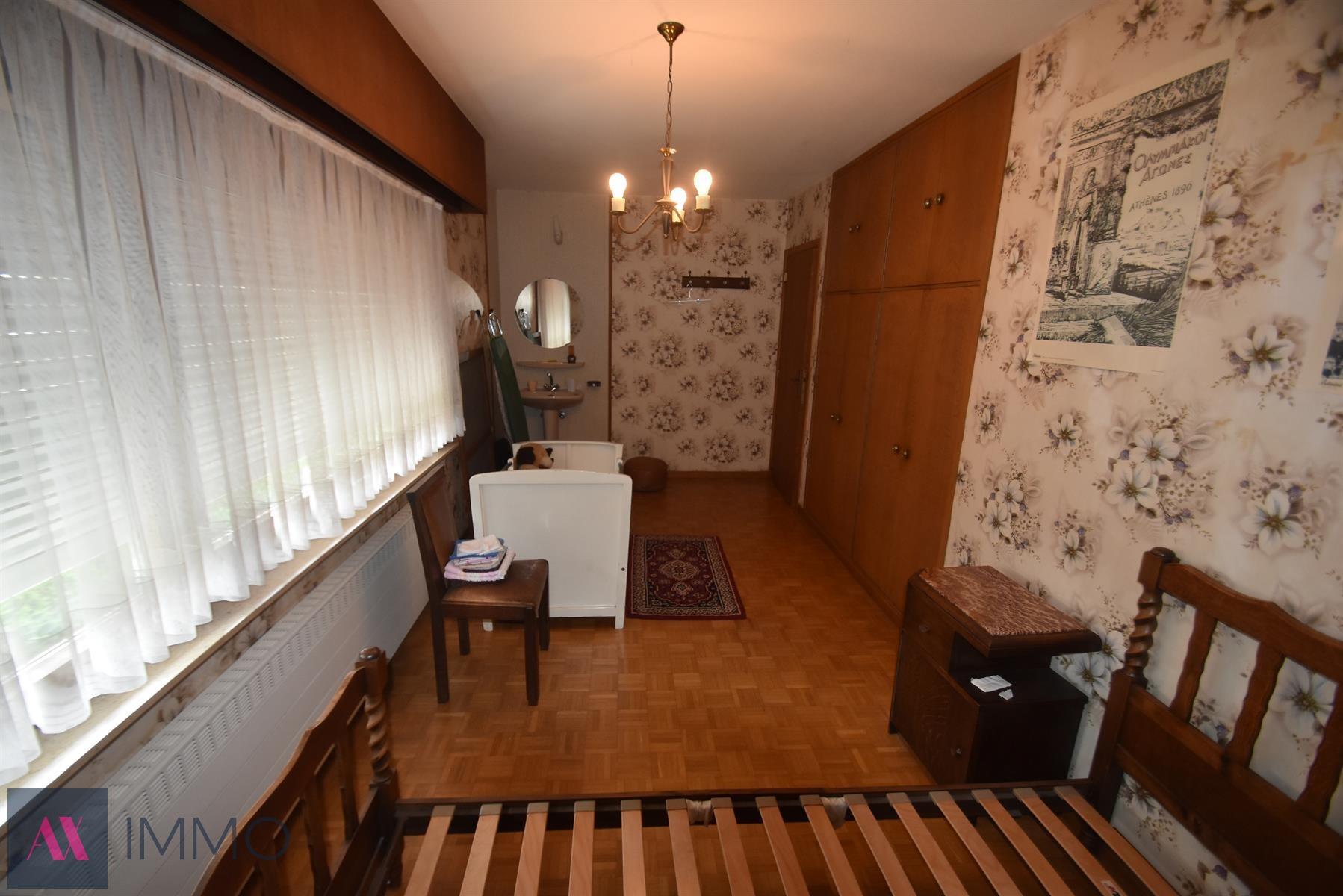 Centr. en rustig gel.woning met 3 slpk., gar., tuin en oprit op 4 are 80 ca foto 16
