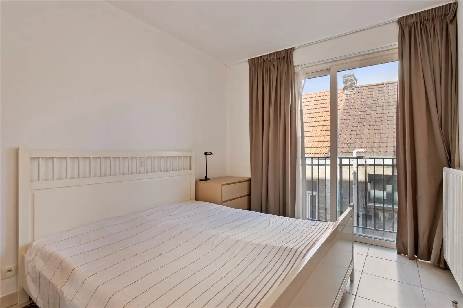 Stijlvol en volledig gemeubeld 2 slaapkamer appartement op toplocatie! foto 4
