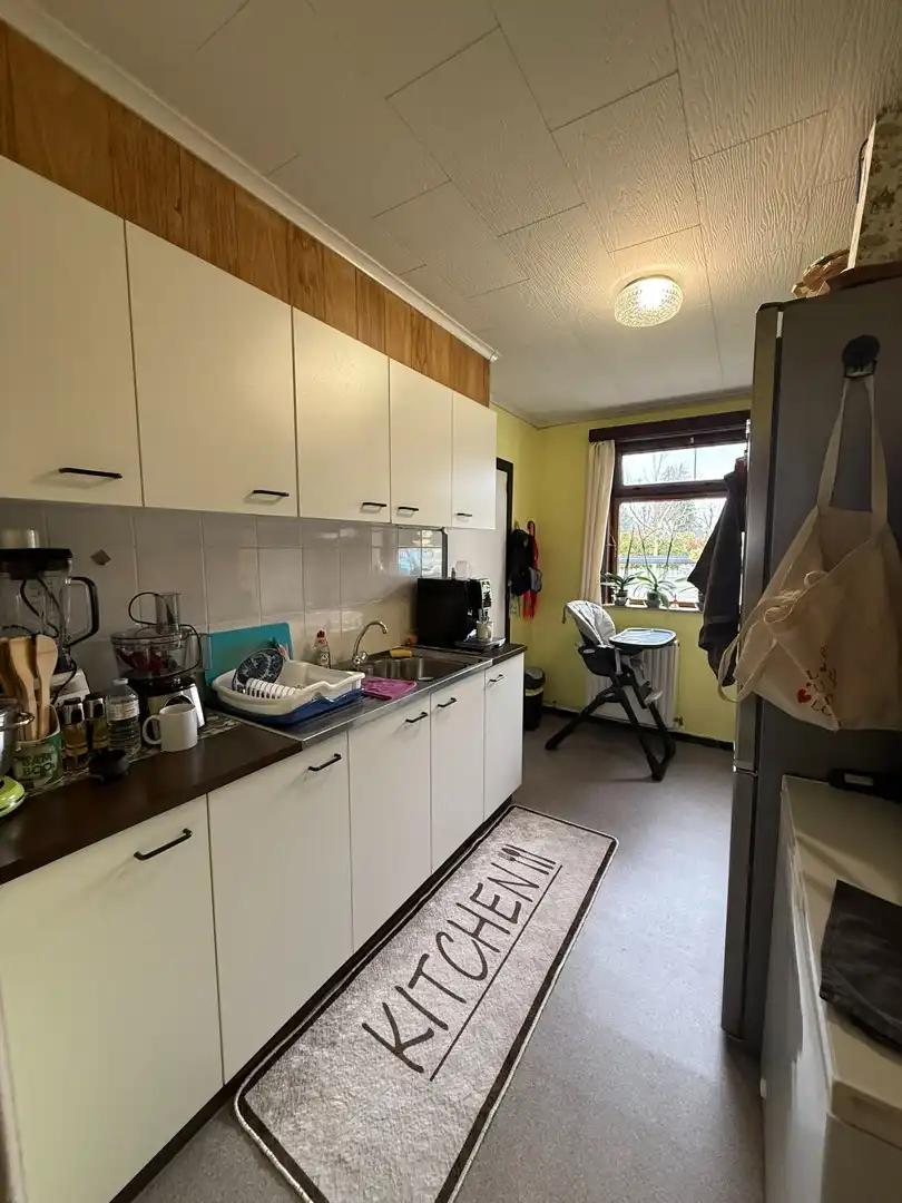 Opbrengsteigendom bestaande uit 2 halfopen woningen met garage en tuin te Hechtel. foto 26