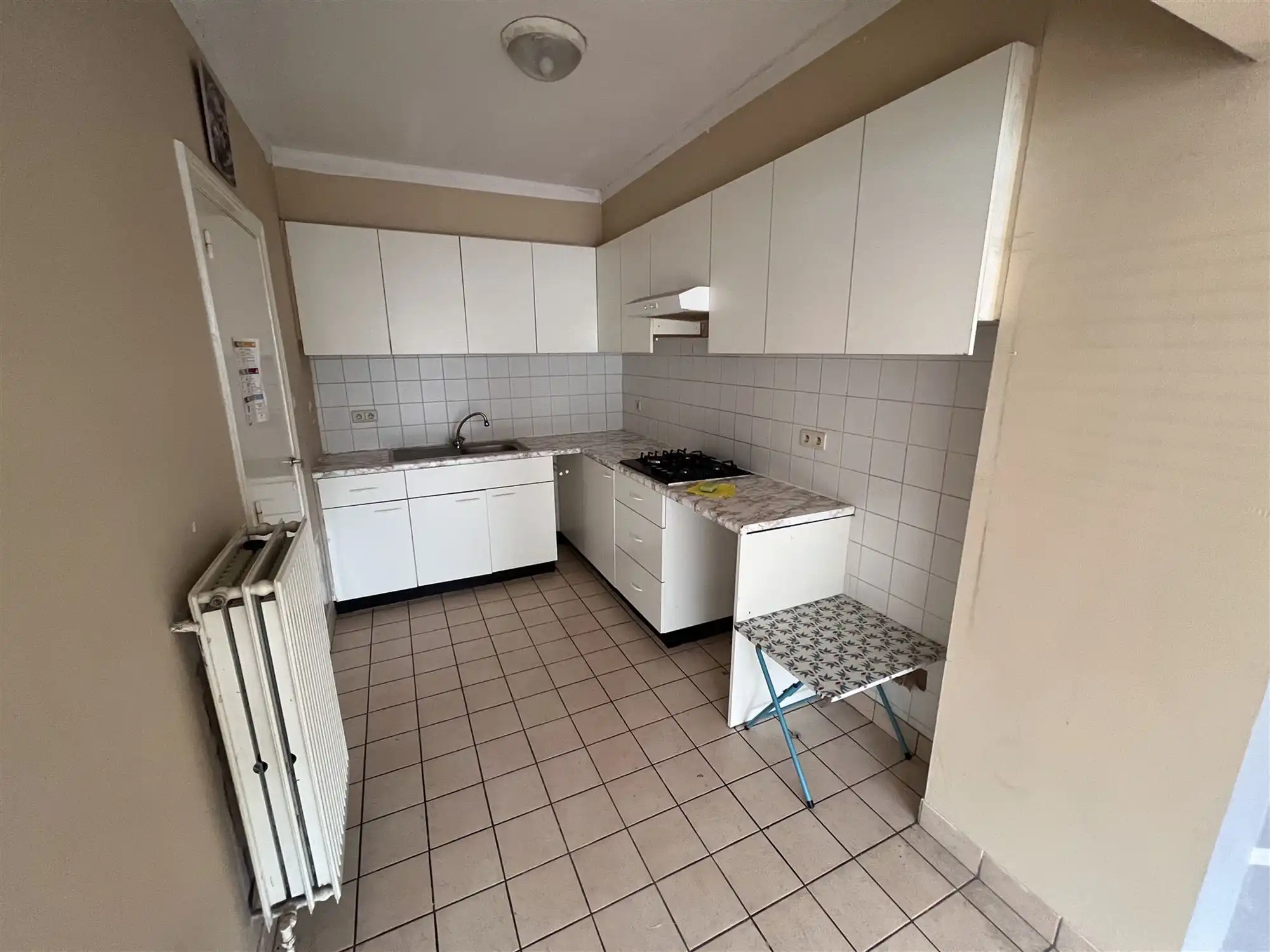 Opbrengsteigendom met 4 appartementen en tuin foto 6