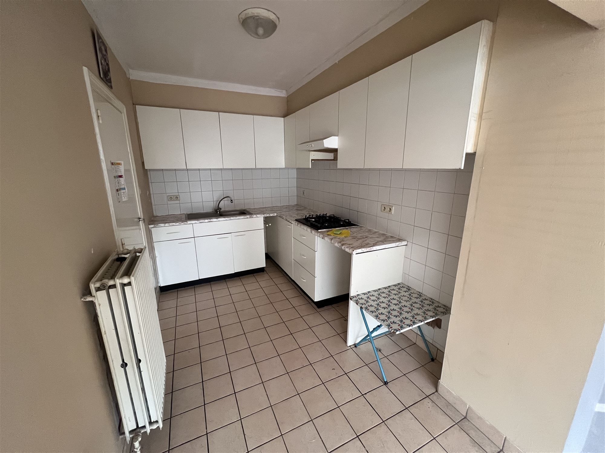 Opbrengsteigendom met 4 appartementen en tuin foto 6