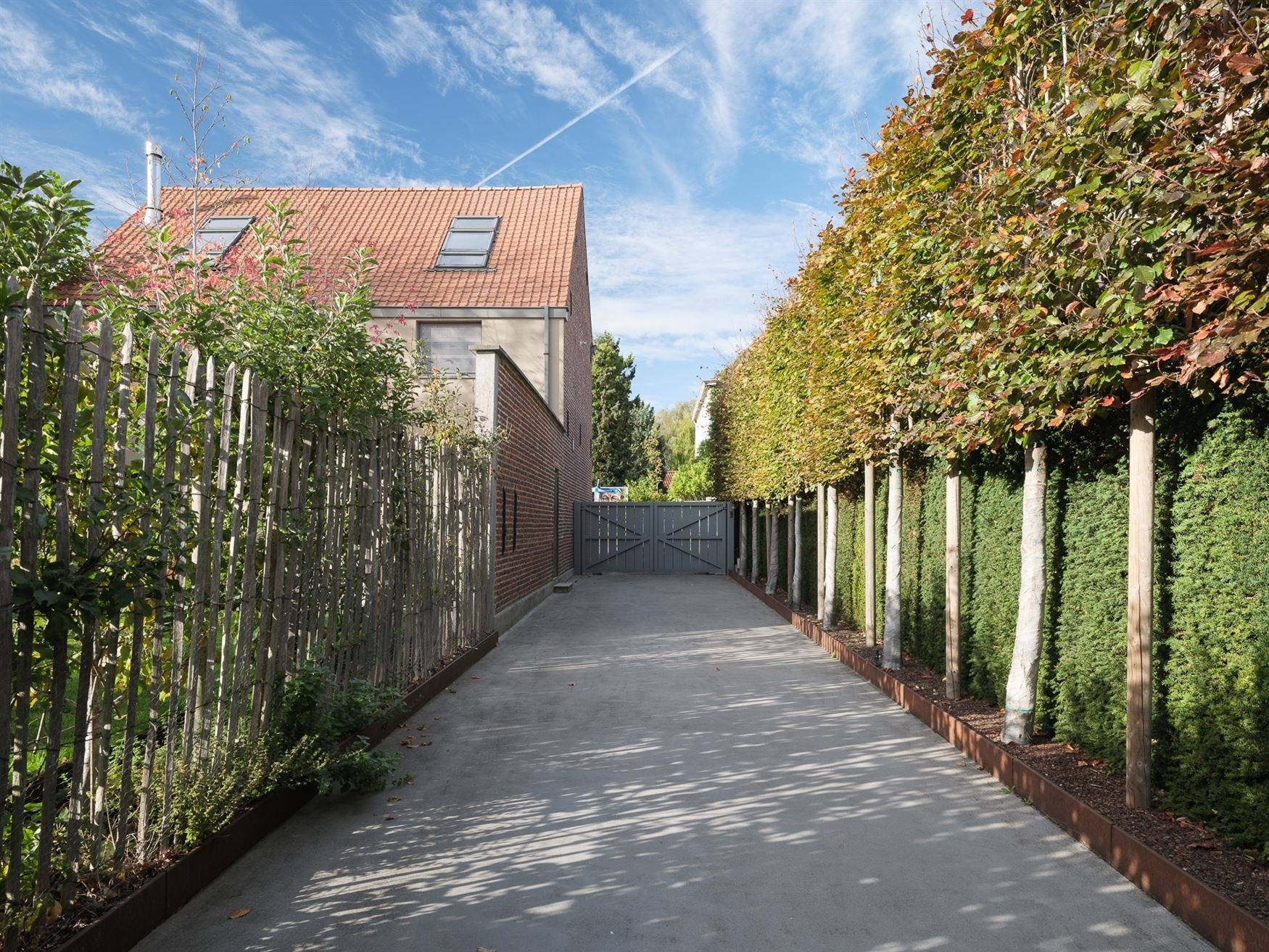 Hoogwaardig afgewerkte herenwoning met zicht op groen en volledige privacy in het hart van Bottelare. foto 20