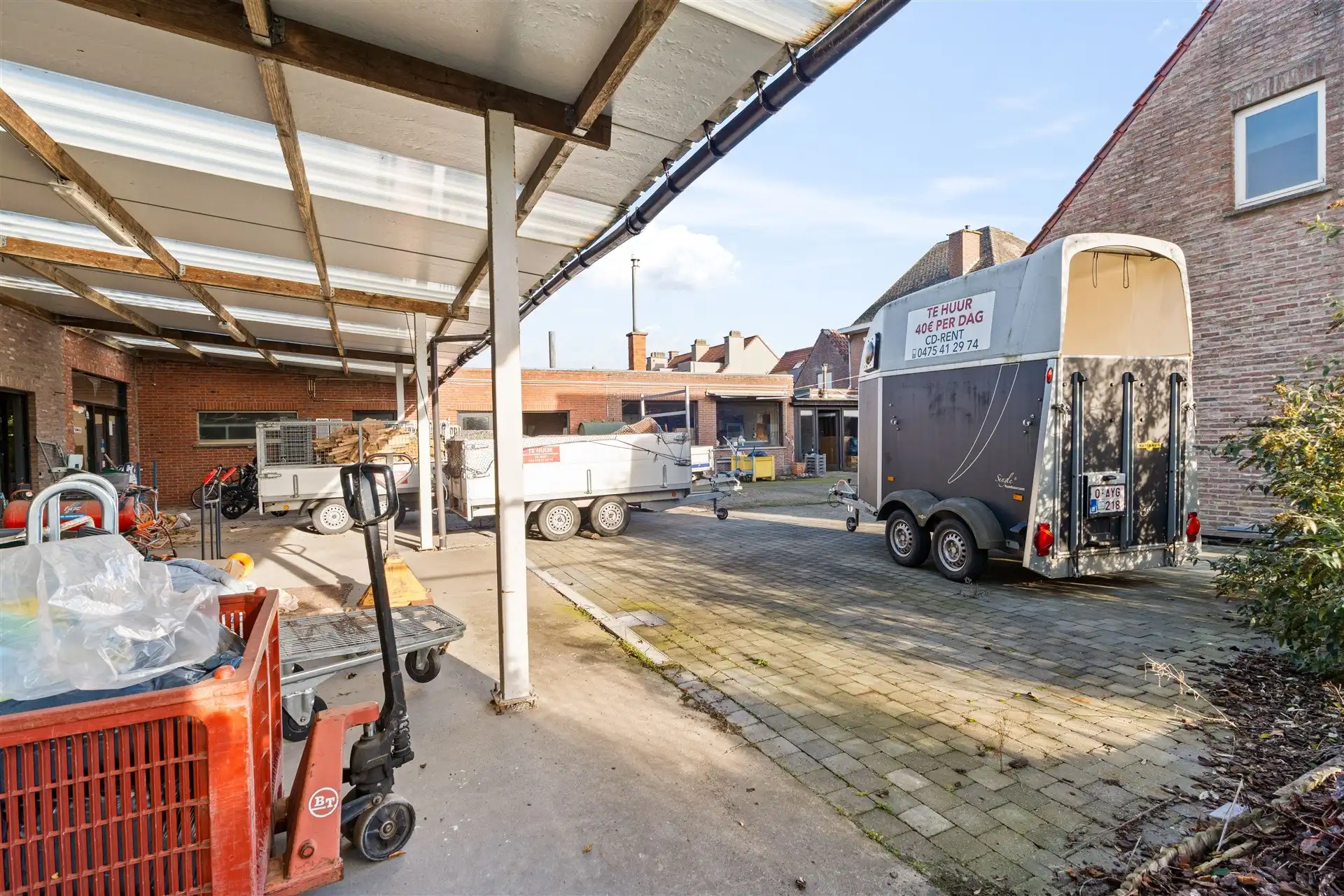 Grote grond met 2 woningen en magazijn van 700m² foto 12