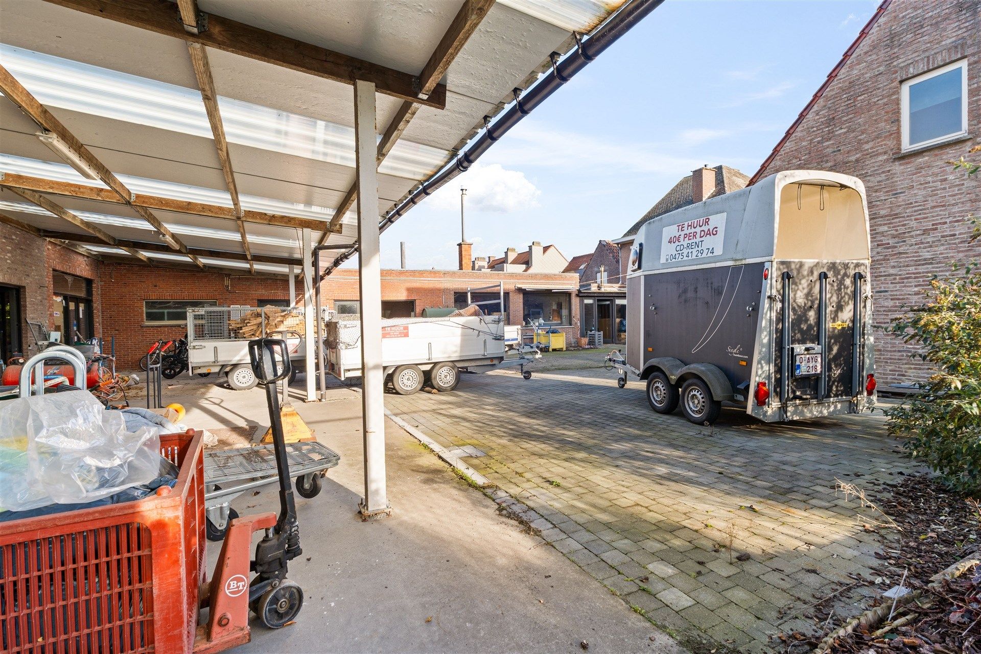 Grote grond met 2 woningen en magazijn van 700m² foto 12