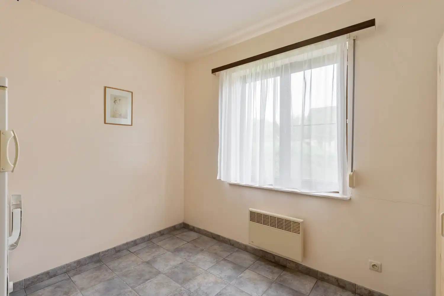 Goed en rustig gelegen woning met 2 slaapkamers, een garage en een tuin te Kessel-Lo! foto 12