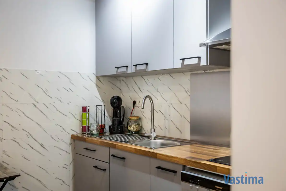 Uniek pand bestaande uit 2 woongelegenheden, garage en buitenruimte foto 7