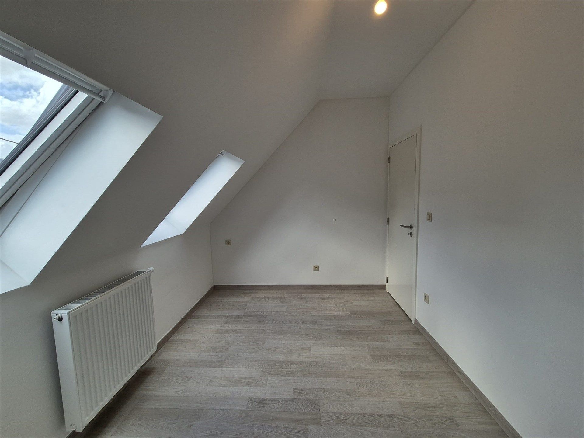 Zeer energiezuinige woning met 2 slaapkamers en tuin. foto 20