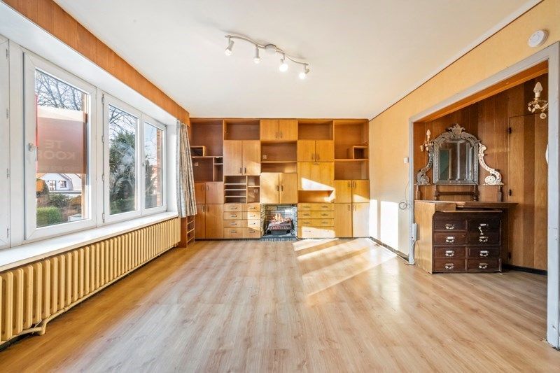 Ruime te renoveren rijwoning met zeer veel mogelijkheden en tuin foto 6