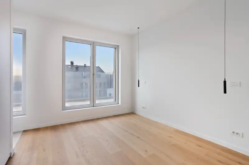 Instapklaar nieuwbouwappartement te huur in hartje Eeklo! foto 15