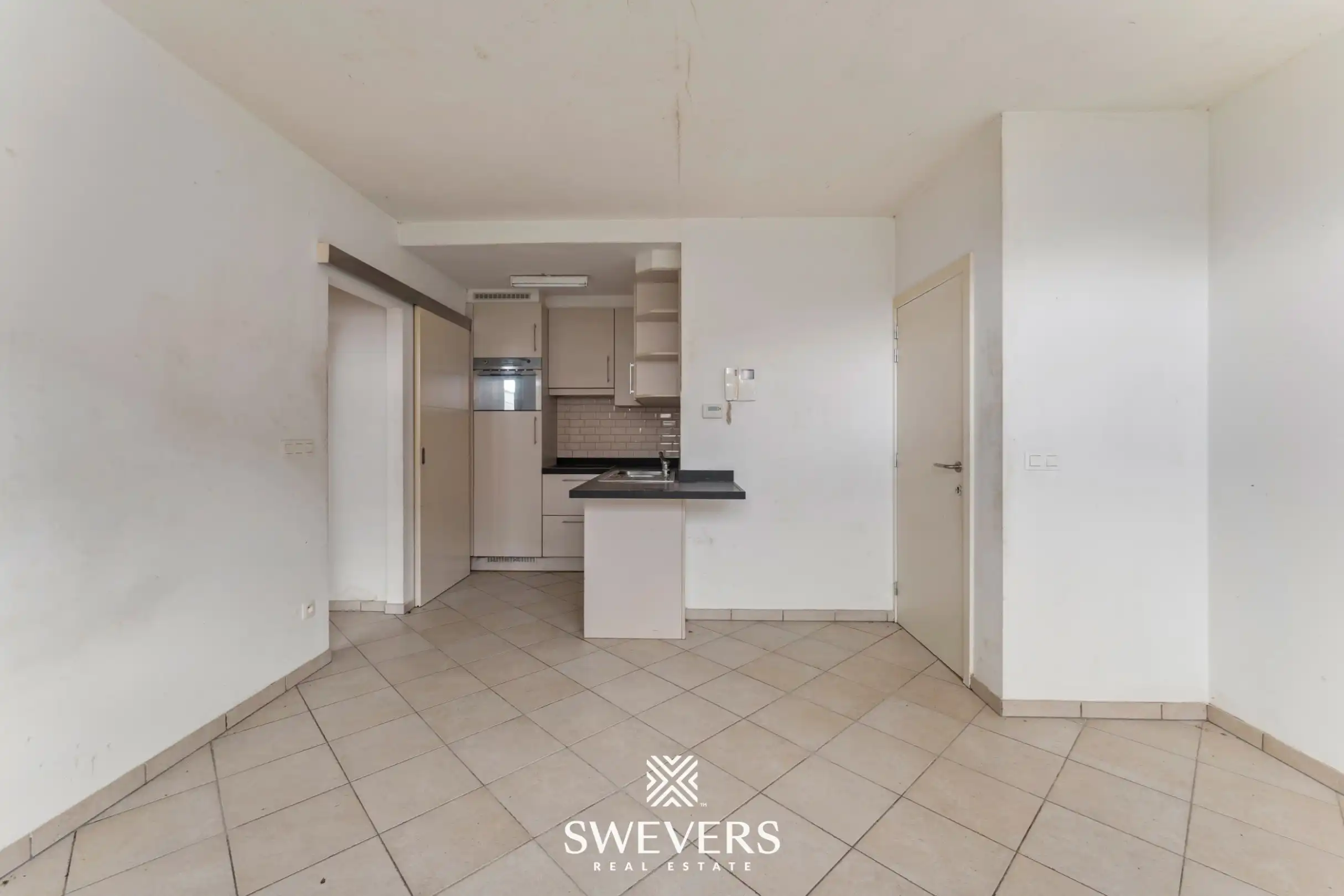 Op te frissen appartement in centrum Halen foto 4