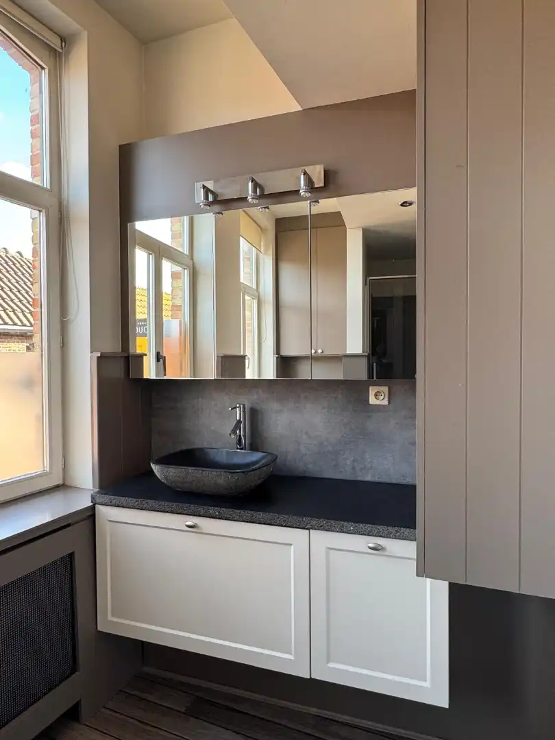 Instapklare trapgevelwoning met zonnig terrastuintje en grote berging, centrum, rustige straat omgeving ’t Zand foto 11