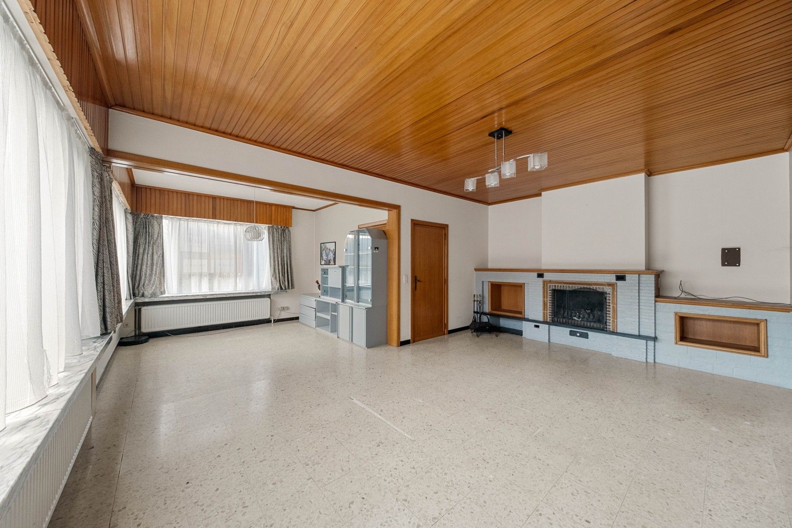 Halfopen gezinswoning in het hart van het landelijke Gontrode, met zicht op agrarisch gebied foto 4