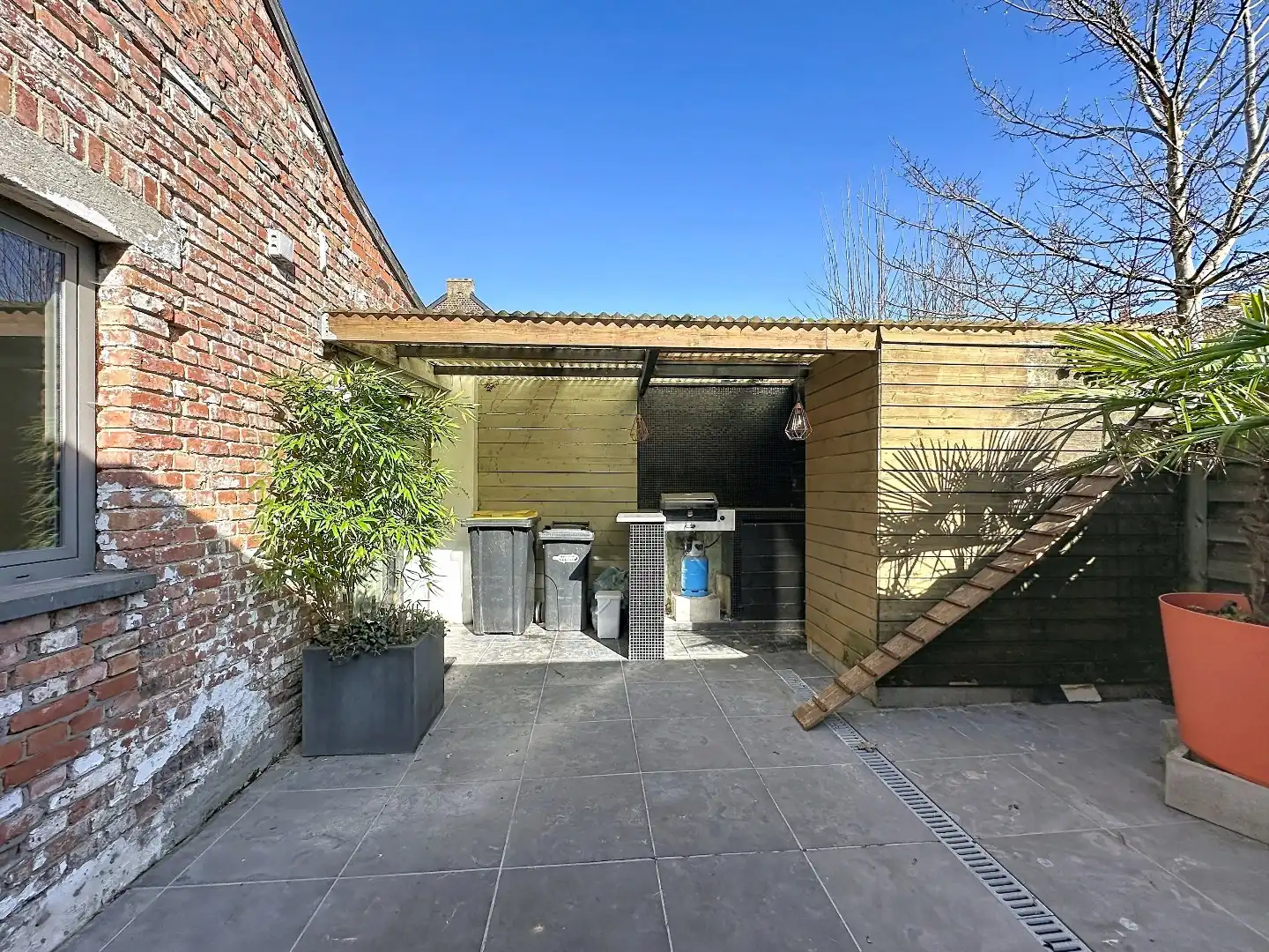 Instapklaar huisje met zonnig terras in Herent foto 16