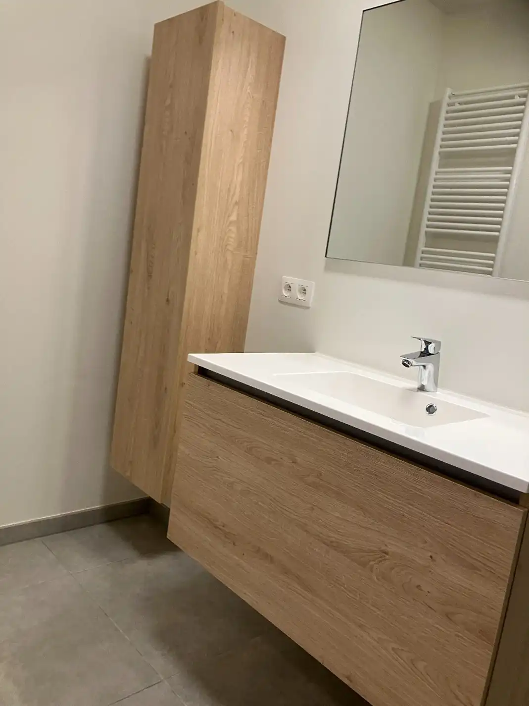 Nieuw gelijkvloers 1-slaapkamerappartement met autostaanplaats en berging! foto 7