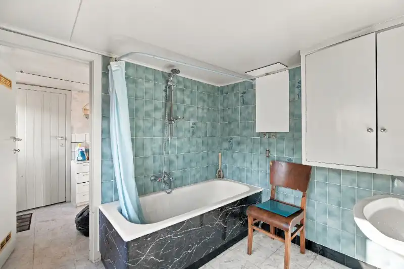 Rijwoning met tuin foto 11