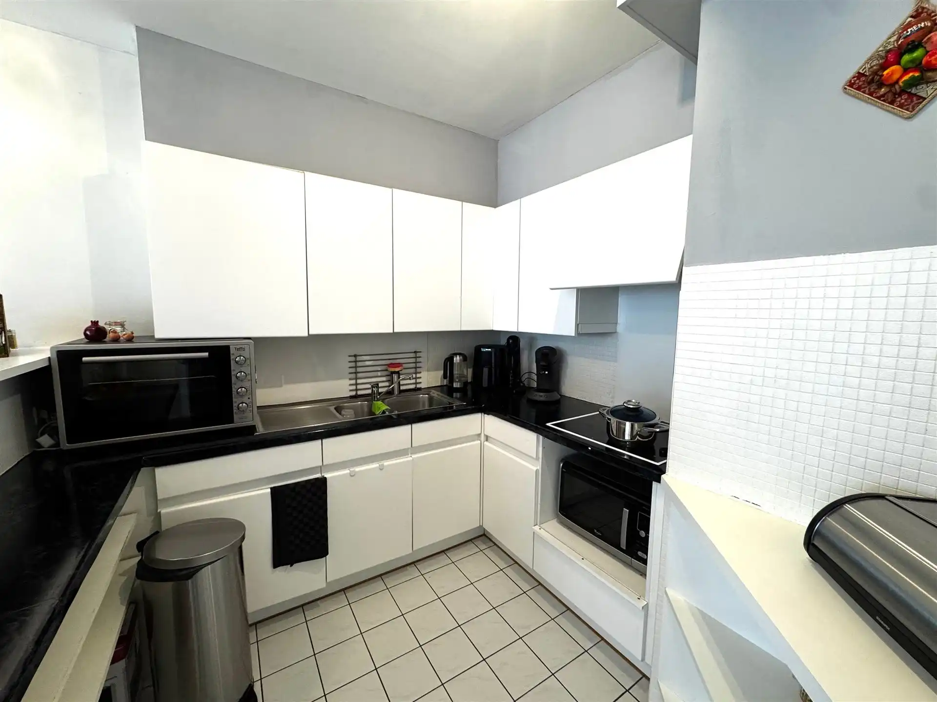 Instapklaar appartement te koop in het hart van Maasmechelen! foto 8