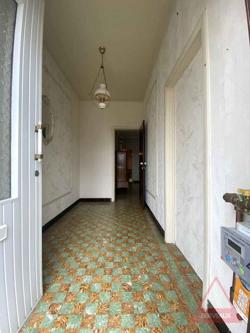 Passendale – Te renoveren woning met tuin, garage en vaste trap naar zolder foto 2