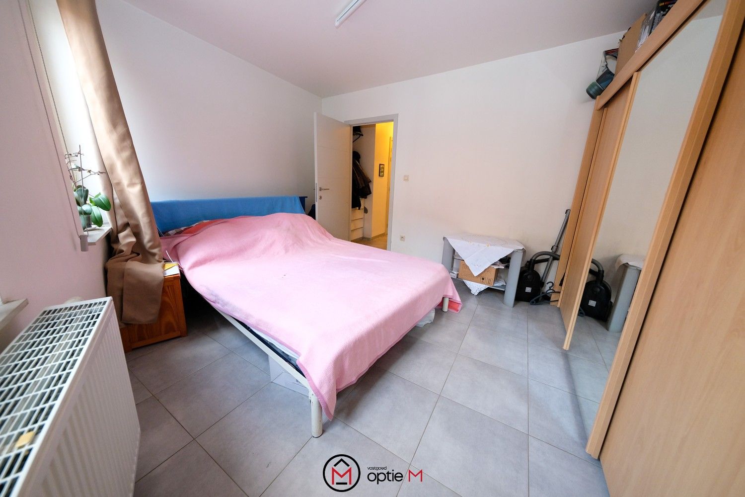 Centraal gelegen appartement met 2 slpks, terras en tuin foto 7