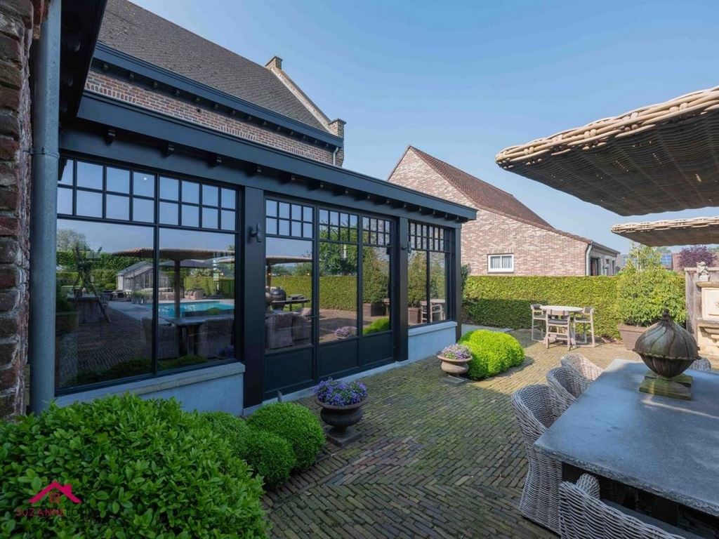 Landelijke villawoning met multifunctioneel aangrenzend gebouw foto 5