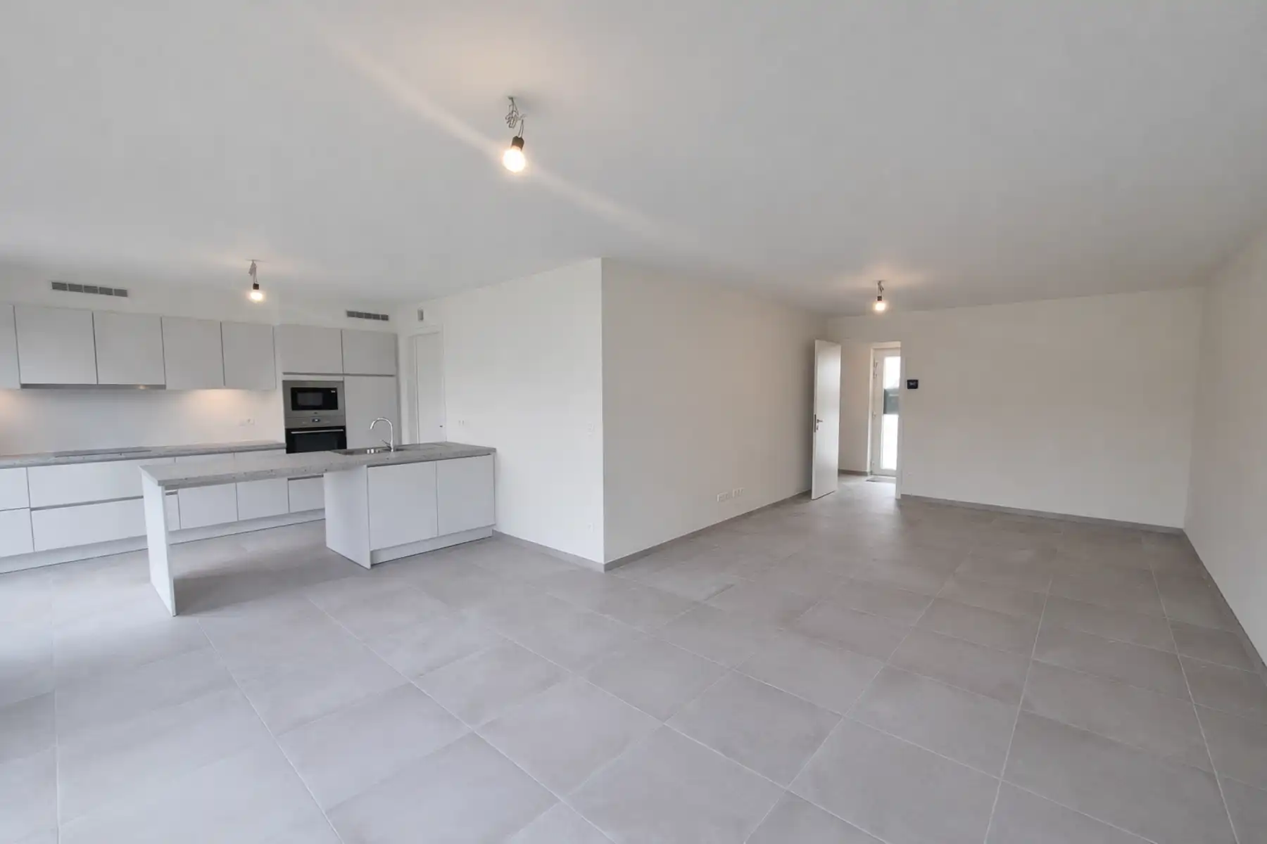 Gesloten bebouwing op de rand van Opwijk en Merchtem foto 4