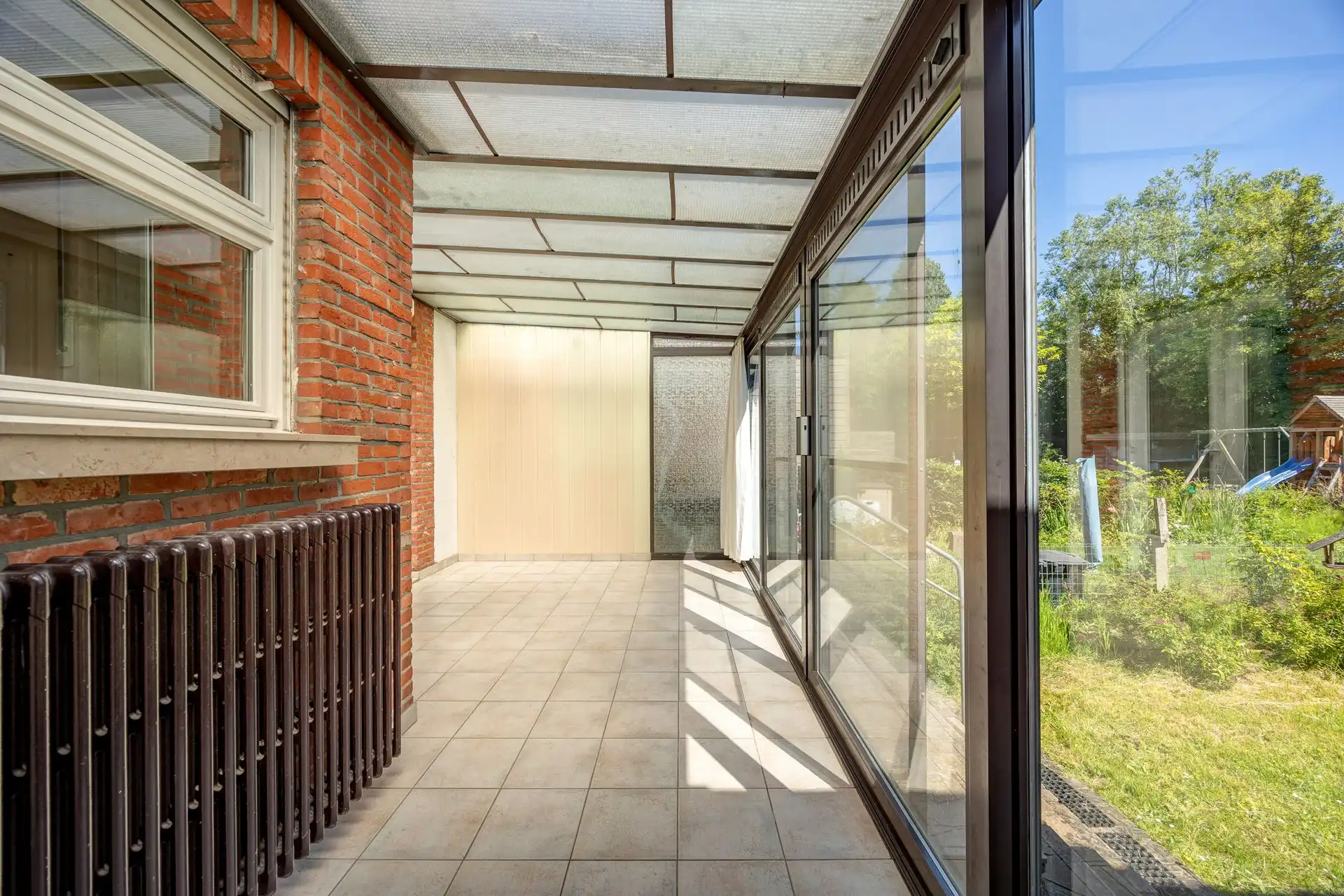 Ruime halfopen bebouwing met garage en zonnige tuin foto 29
