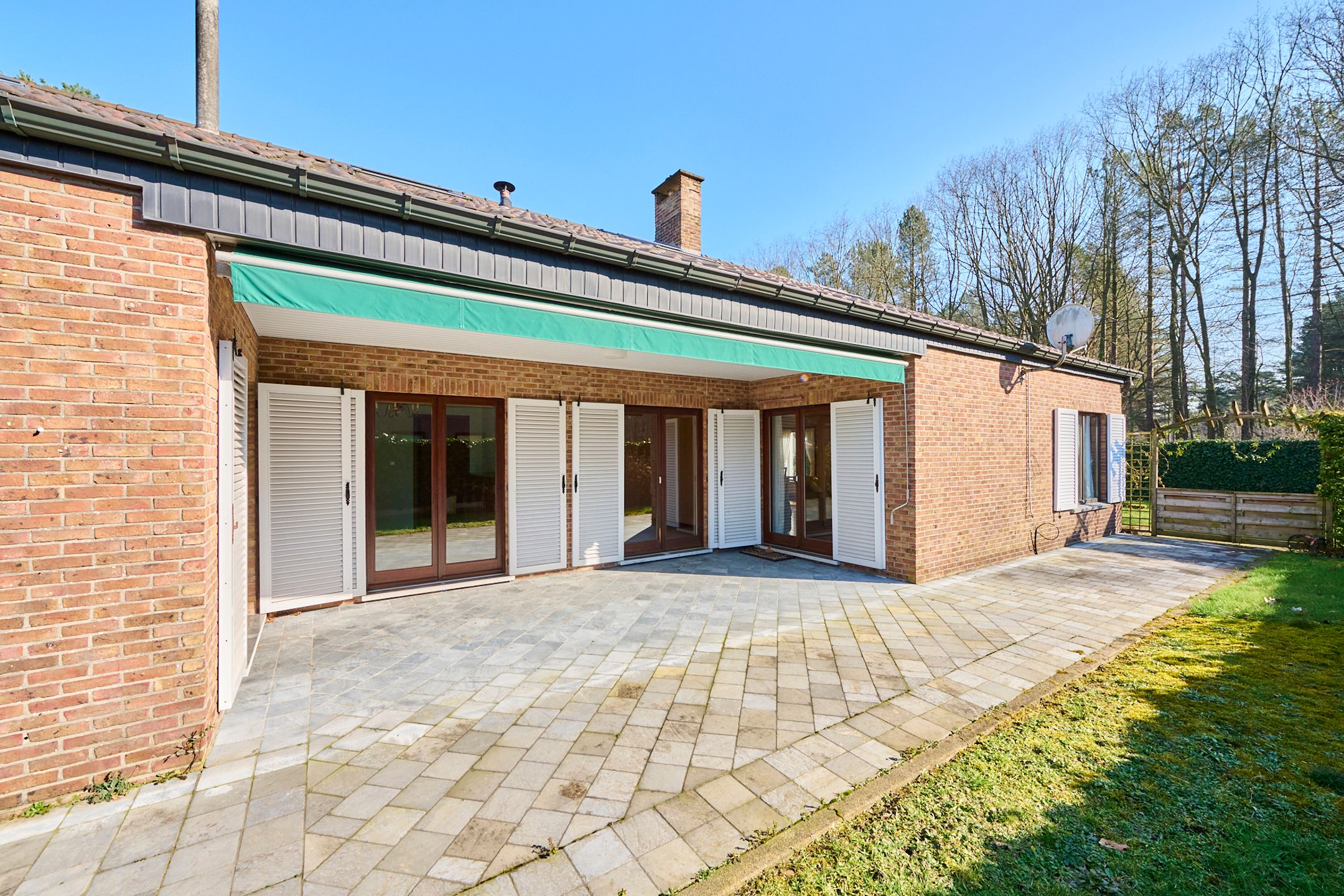 Zeer ruime gezinswoning + bovenliggend appartement foto 4